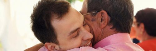 two men hugs expressing gratitude appreciation