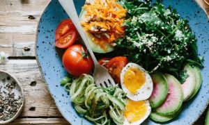 healthy snack bowl salad boiled eggs tomatoes avocado