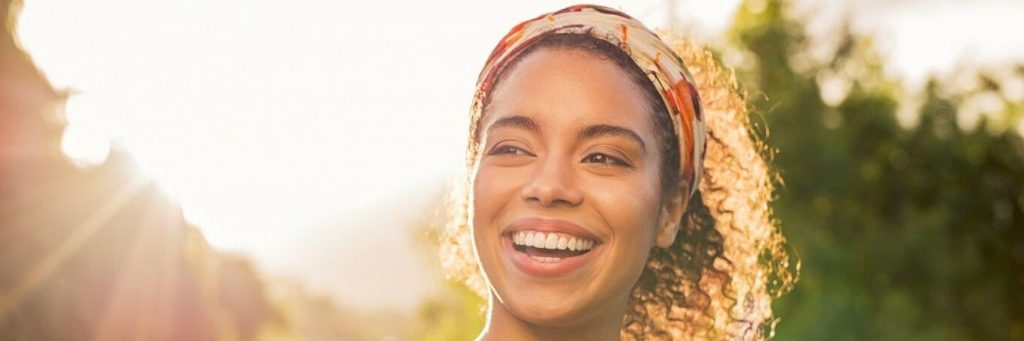 woman happy face smiling sunny shining sky