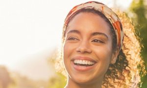 woman happy face smiling sunny shining sky