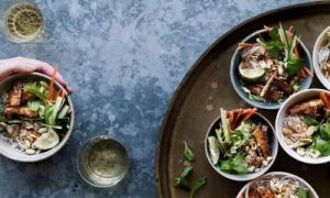 healthy salad bowl on brown plate