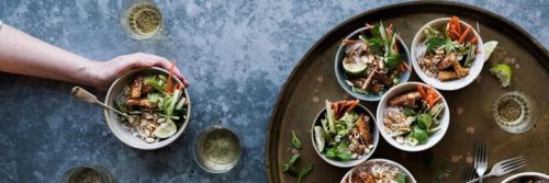 healthy salad bowl on brown plate