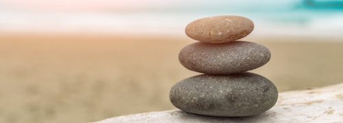 balanced stones on rock