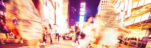 vibrant city people walking crossing streets car honking