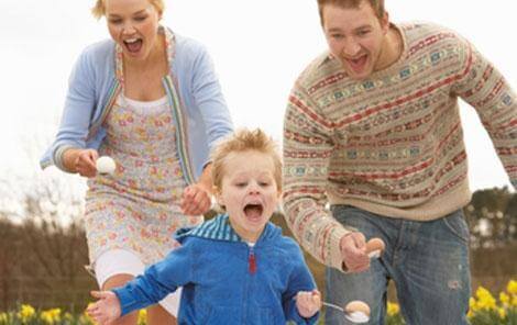 Parents and child egg and spoon race