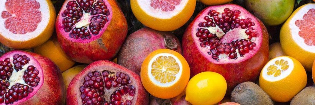 healthy high in vitamin c fruit orange pomegranate lemon