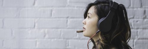 woman wearing headphone talking