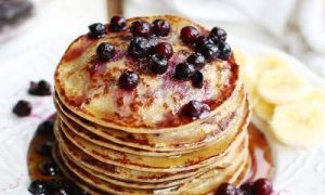 delicious pancake topped with black pearls brown sugar banana pieces