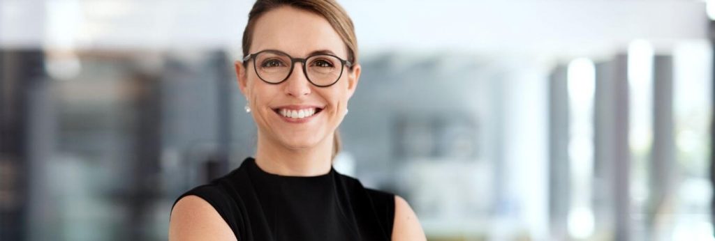 successful businesswoman smiles in office