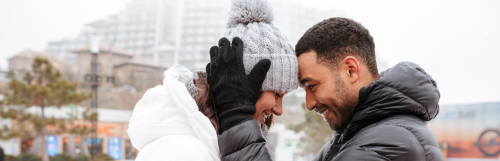 couple faces each other smiles symbolizing happiness