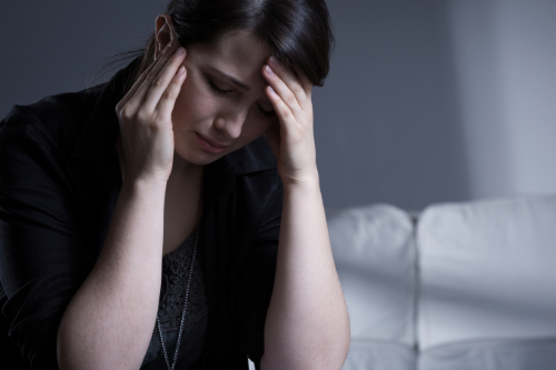 Crying widow having trauma after her husband's death