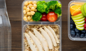 healthy fiber meal water bottle broccoli tomato brown rice sliced chicken kiwi orange blueberry raspberry almond nut